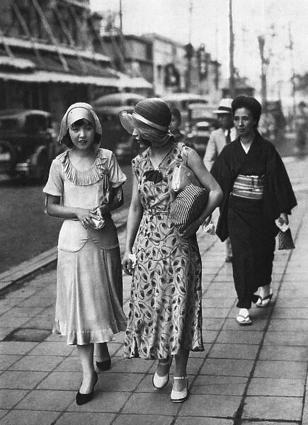 Japanese women contrasting in dress