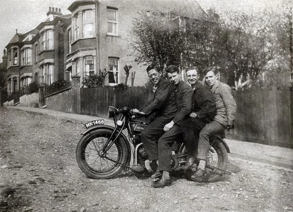 Four men on a 1923 Rudge motorcycle