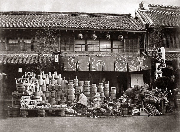 Vendor of pots and brooms, Japan, circa 1870s. Date: circa 1870s