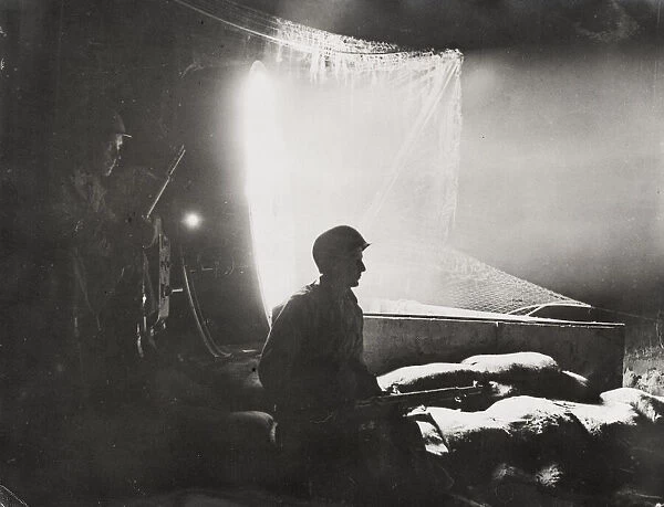 World War II searchlights illuminate German positions