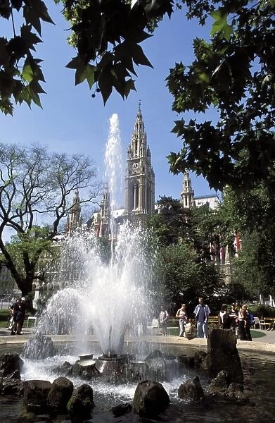 Fountain with water jets and Town Hall, Innere Stadt, Vienna, Austria, Europe