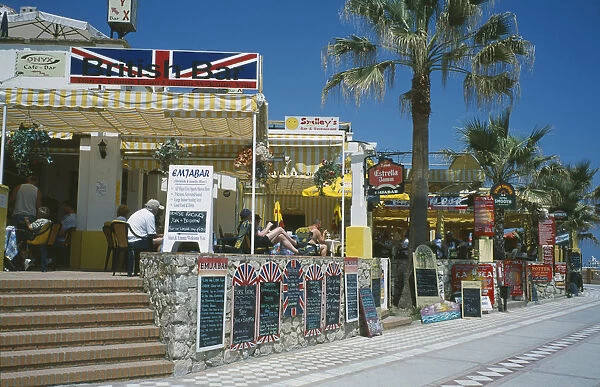 20069951. SPAIN Andalucia Benalmadena Promenade with English restaurant and bar signs