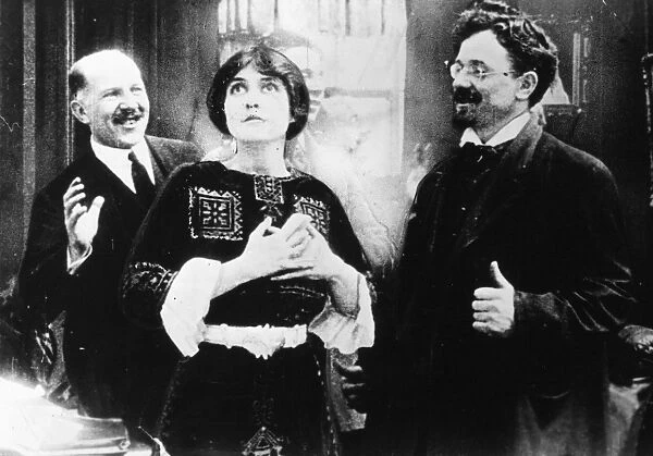 LEON TROTSKY (1879-1940). N Lev Davidovich Bronstein. Russian Communist leader. Trotsky, at right, as a movie extra in Brooklyn with Clara Kimball Young, prior to the Bolshevik Revolution