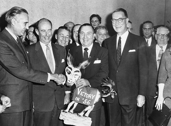RICHARD J. DALEY (1902-1976). American politician. Hosting a reception of the Cook County Democratic Committee for visiting members of the Democratic National Committee at Chicago, Illinois, 18 November 1955. Left to right: Governor Averill Harriman of New York, presidential candidate Adlai Stevenson, Mayor Daley, and Senator Estes Kefauver of Tennessee