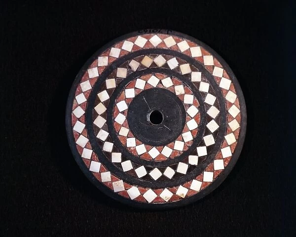 Ancient Egyptian steatite and ivory disc from spinning top with geometric motifs, 4th millennium B. C