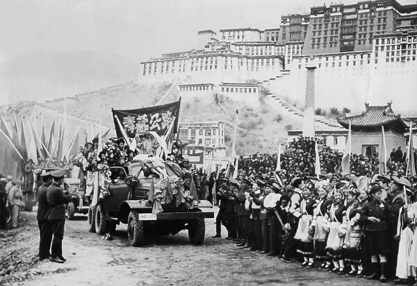 Chinese peoples republic invasion of tibet, 1954, the chinese authority stage a parade in lhasa, december 25th, 1954, potala palace (home of the dalai lama) in the background