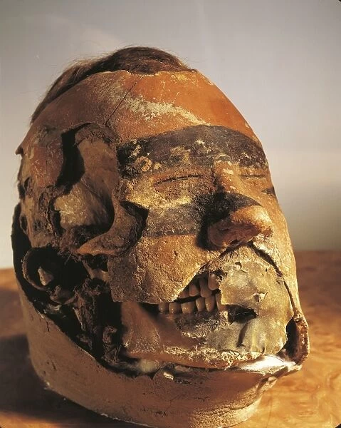 Funerary mask from a tomb found in the Oglahty mountains