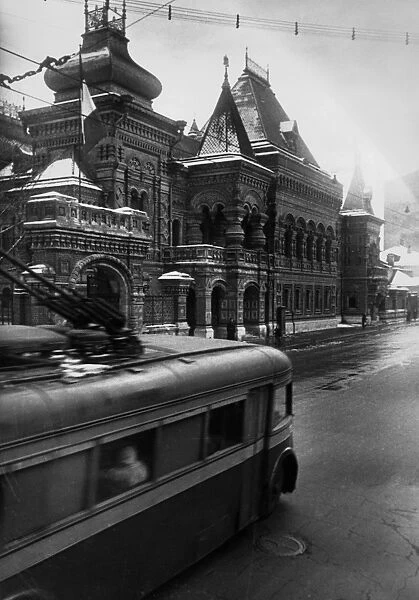 Moscow, late 1930s, a trolley-bus going past the french embassy building