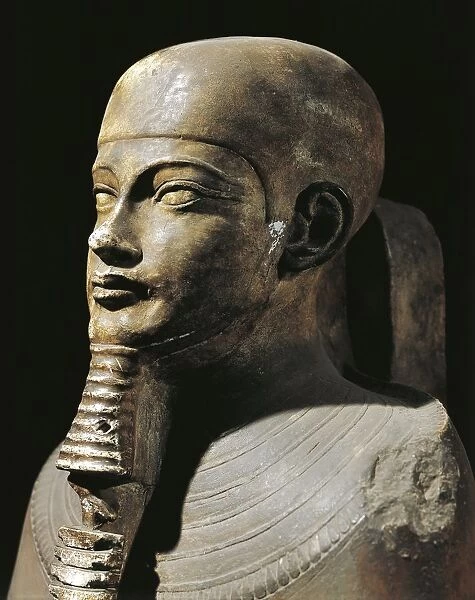 Detail of sculpture of the god Ptah seated on a throne