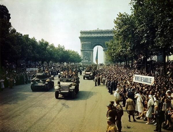 World War II 1939-1945: Crowds lining the Champs Elysees to view Allied tanks