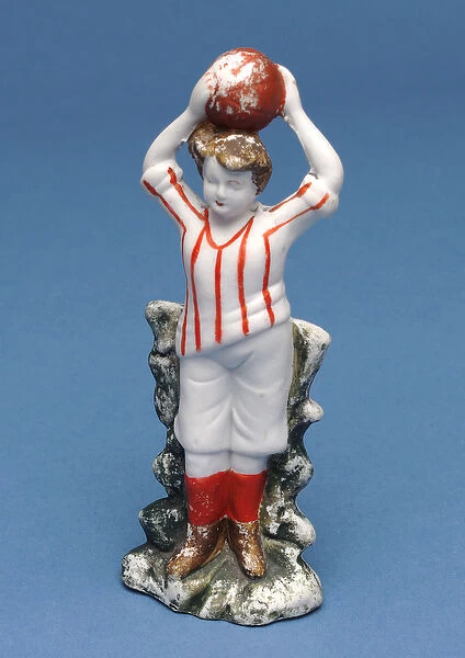 Bisque figure of a footballer throwing the ball in (ceramic)