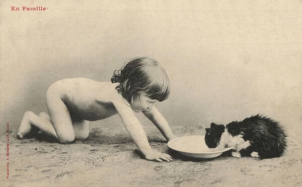 Child with a kitten (b  /  w photo)