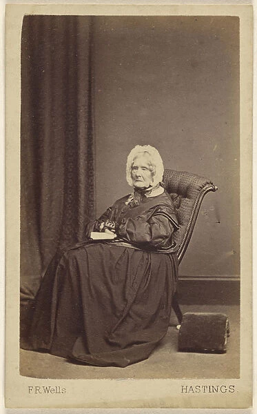 elderly woman seated F. R Wells British active Hastings