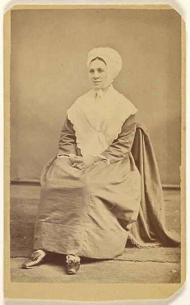 woman wearing bonnet shawl seated F James Evans
