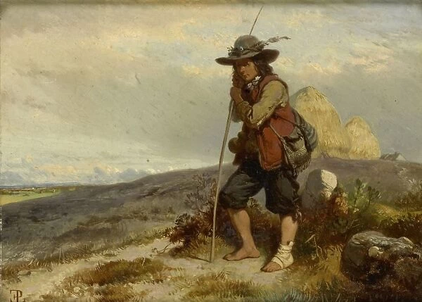 A young Herdsman shepherd boy standing hilltop