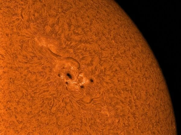 H-alpha Sun in orange with active area