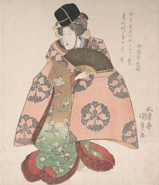 Kabuki Actor in a Female Role Standing with a Fan, 19th century. 19th century