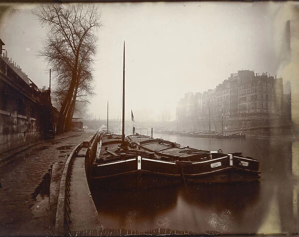 Pont Neuf, Paris, France circa 1923 by Eugene Atget. Eugene Atget, full name Jean-Eugene-Auguste Atget, 1857 - 1927. French photographer, famed for his decades long work to document the architecture and aura of Paris before all was lost to modernisation