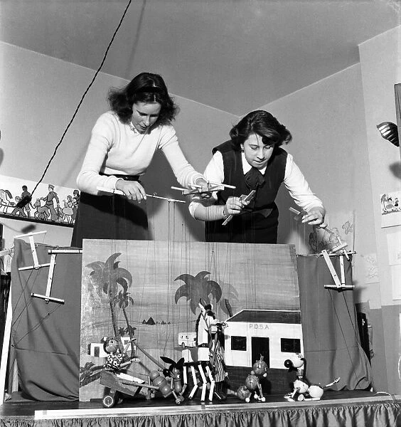 Baley and mother puppet show. March 1953 D106