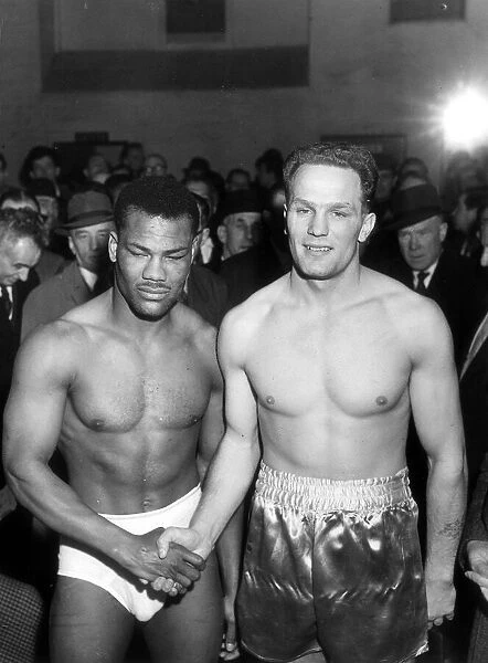 Joe Bygraves British Heavyweight champion with Henry cooper Weigh In at Earls Court