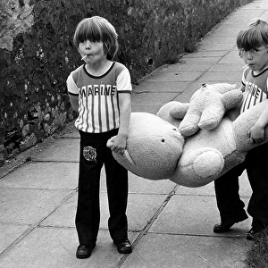 Two boys with teddy bears, Redruth, Cornwall