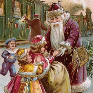 Father Christmas distributing gifts - children rail station