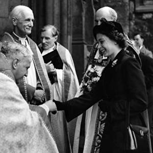 Princess Elizabeth distributes Maundy money, 1952
