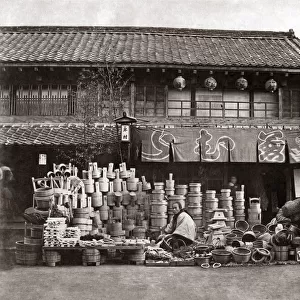 Vendor of pots and brooms, Japan, circa 1870s. Date: circa 1870s