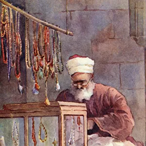 Vendor of Turkish chaplets in a Bazaar