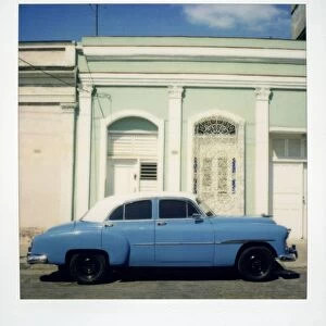 Polaroid of blue classic American Car, Cienfuegos, Cuba, West Indies, Central America