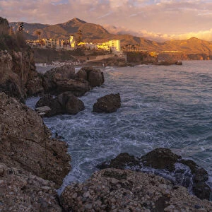 View of Parroquia El Salvador and coastline at sunset in Nerja, Nerja, Malaga Province, Andalucia, Spain, Mediterranean, Europe
