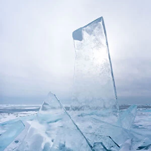Pieces of ice with sun reflection at lake Baikal, Irkutsk region, Siberia, Russia