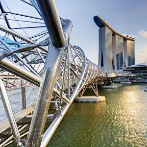 Singapore, the Helix bridge leading across Marina Bay to the Marina Bay Sands hotel
