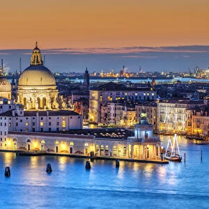 Sunset view over Basilica of Santa Maria della Salute and Grand Canal, Venice, Veneto