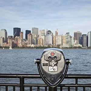 USA, New Jersey, Jersey City, Coin operated binoculars pointed at Manhattan skyline
