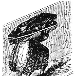 WOMAN IN COAL MINE, 1842. A woman working in a British coal mine. Wood engraving from the mines report of a Royal Commision, 1842