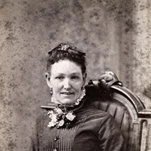 WOMENs FASHION, 1880s. Original carte-de-visite photograph of an American woman