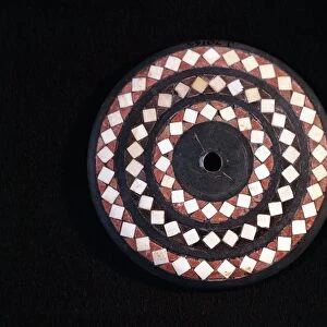 Ancient Egyptian steatite and ivory disc from spinning top with geometric motifs, 4th millennium B. C