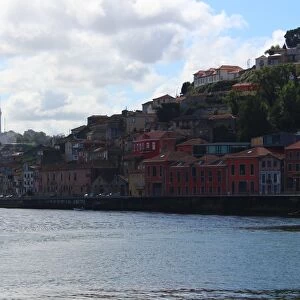 View of a street in Ribeira district of Porto, in the background Vila Nova de Gaia. Portugal