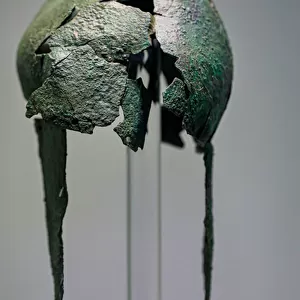 Bronze helmet with cheek-guards. Knossos. 1400-1300 BC