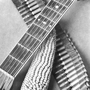 Mexican Revolution, Guitar, Corn and Ammunition Belt, Mexico City, 1927 (b / w photo)