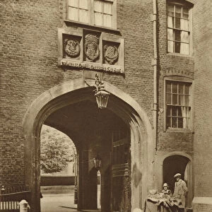 Tudor gateway leading into Lincolns Inn from Chancery Lane (b / w photo)