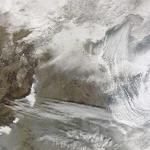 Snow cover encircles Bo Hai and extends to the north and west of that water body