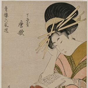The Courtesan Karauta of Chojiya Reading a Book... late 1790s. Creator: Kitagawa Utamaro