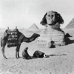 Praying before a sphinx, Cairo, Egypt, c1920s