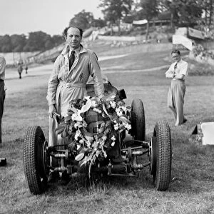 Raymond Mays with his ERA at Brooklands, Surrey, 1936. Artist: Bill Brunell