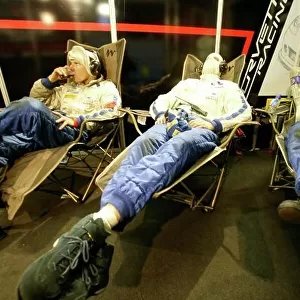 2007 FIA GT Championship. Spa, Belgium. 26th - 29th July 2007. The tired mechanics of Anthony Kumpen/Bert Longin/Kurt Mollekens/Frederic Bouvy (Corvette C5 GT1) asleep in the garage. Atmosphere. World Copyright: Drew Gibson/LAT Photographic. Ref