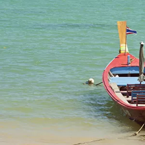 Thailand, Phuket, Rawaii Beach, Close up of longtail boats along the in water