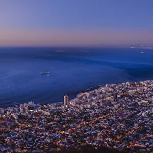 View of Cape Town Skyline and Atlantic Ocean coast at dusk, South Africa