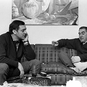 Actor Harry Corbett and Toyn Hancock sit talking in February 1963